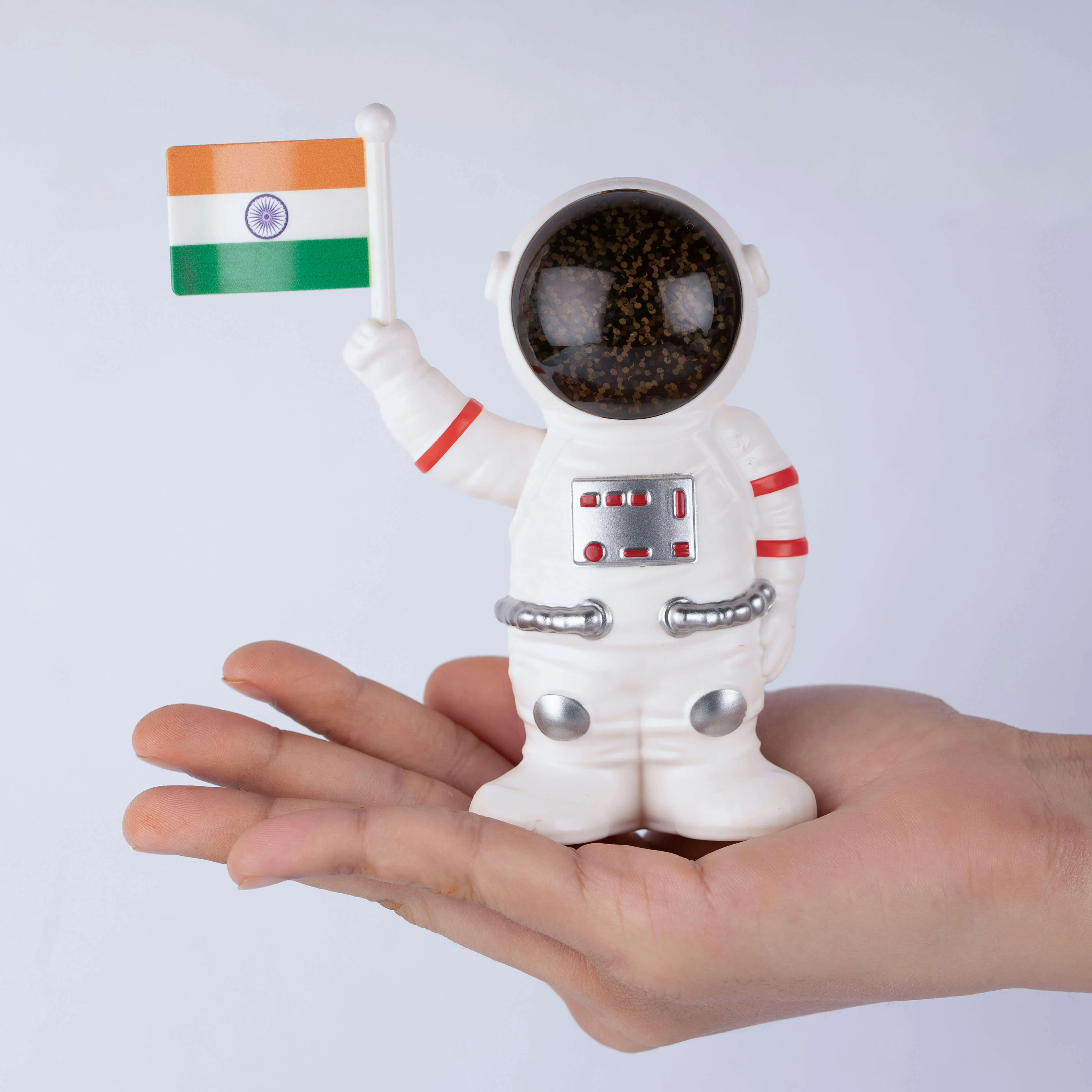 Solar Powered Astronaut Flag Figurine